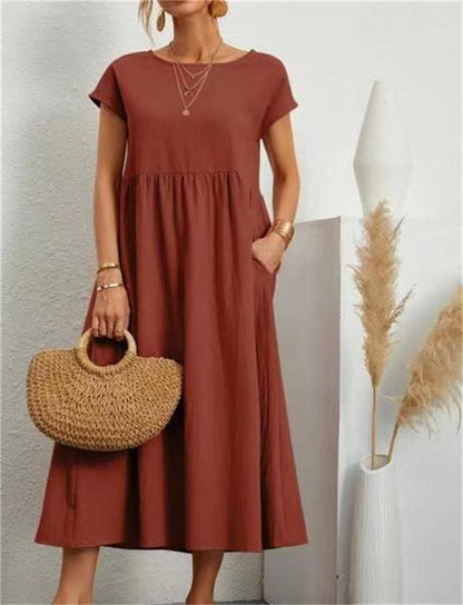 Elegant long dress with short sleeves and a loose fit